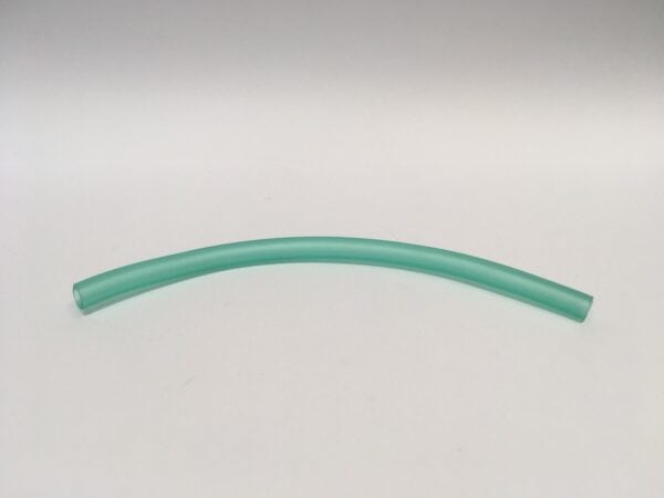 A translucent plastic tube, slightly curved and similar to the green silicone fuel hose, on a light and simple background.
