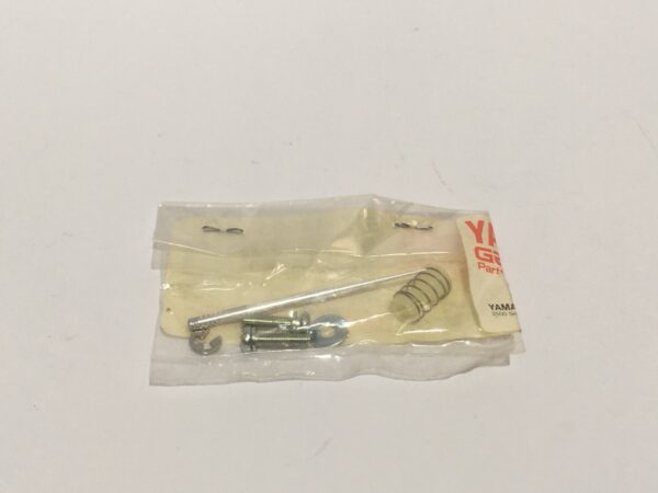 A bag of Main jet needle 5C3A shows a metal rod, a spiral spring, and small metal parts on an impeccable white background.